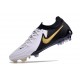 Chaussure Nike Phantom Luna 2 Elite L FG Blanc Noir Pièce Dor Métallique