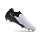 Chaussure Nike Phantom Luna 2 Elite L FG Blanc Noir Pièce Dor Métallique