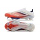 Crampons adidas F50+ LL FG Advancement – Blanc Rouge Bleu