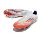 Crampons adidas F50+ LL FG Advancement – Blanc Rouge Bleu